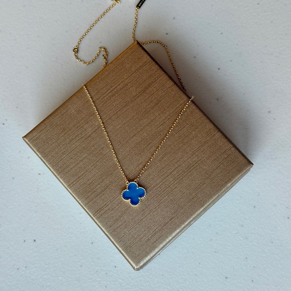 Elegant Blue and Gold Clover Necklace